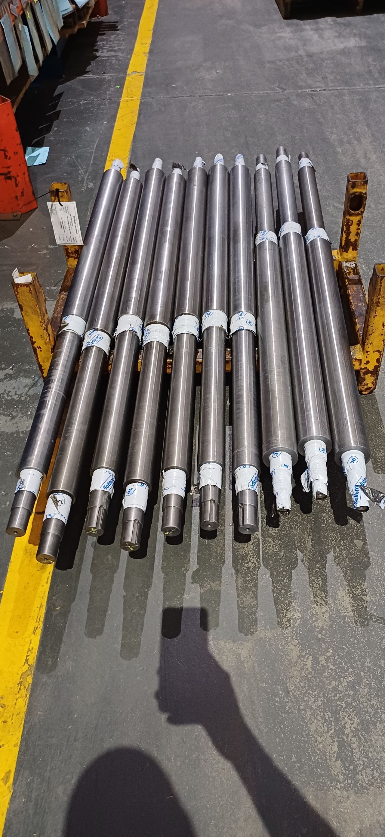 Same shafts after Corrosion Assassin — clean machined steel